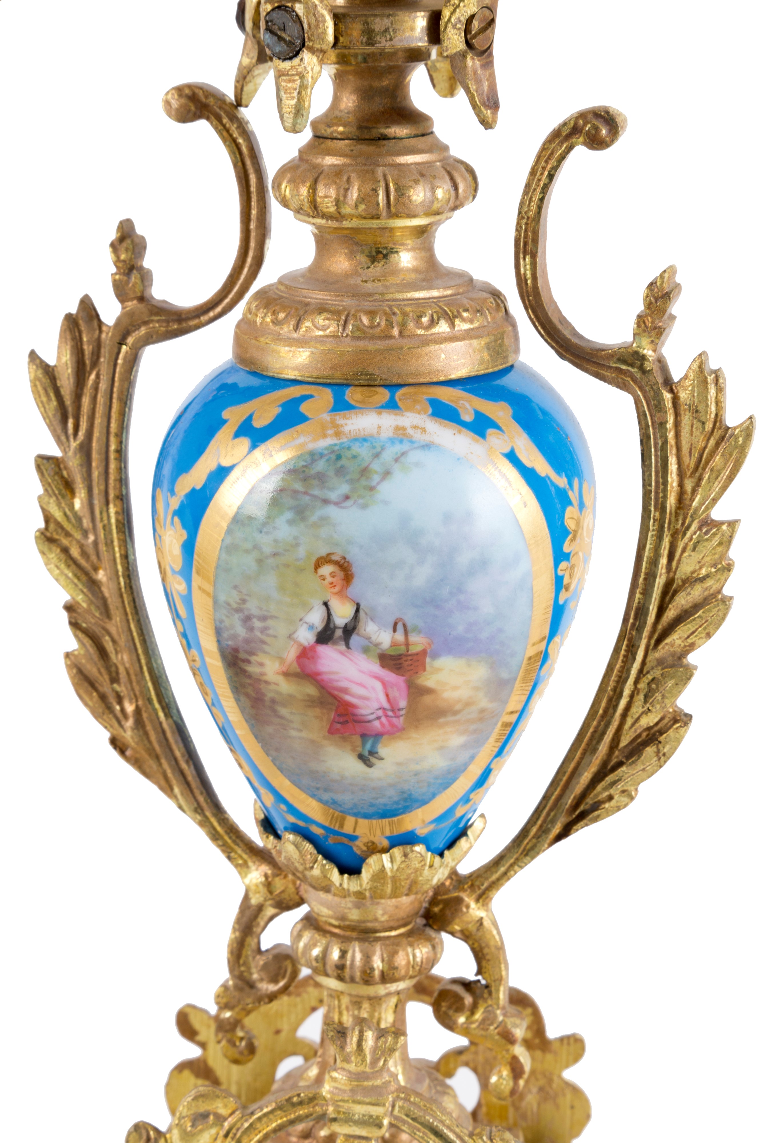 Coppia di candelabri in bronzo dorato