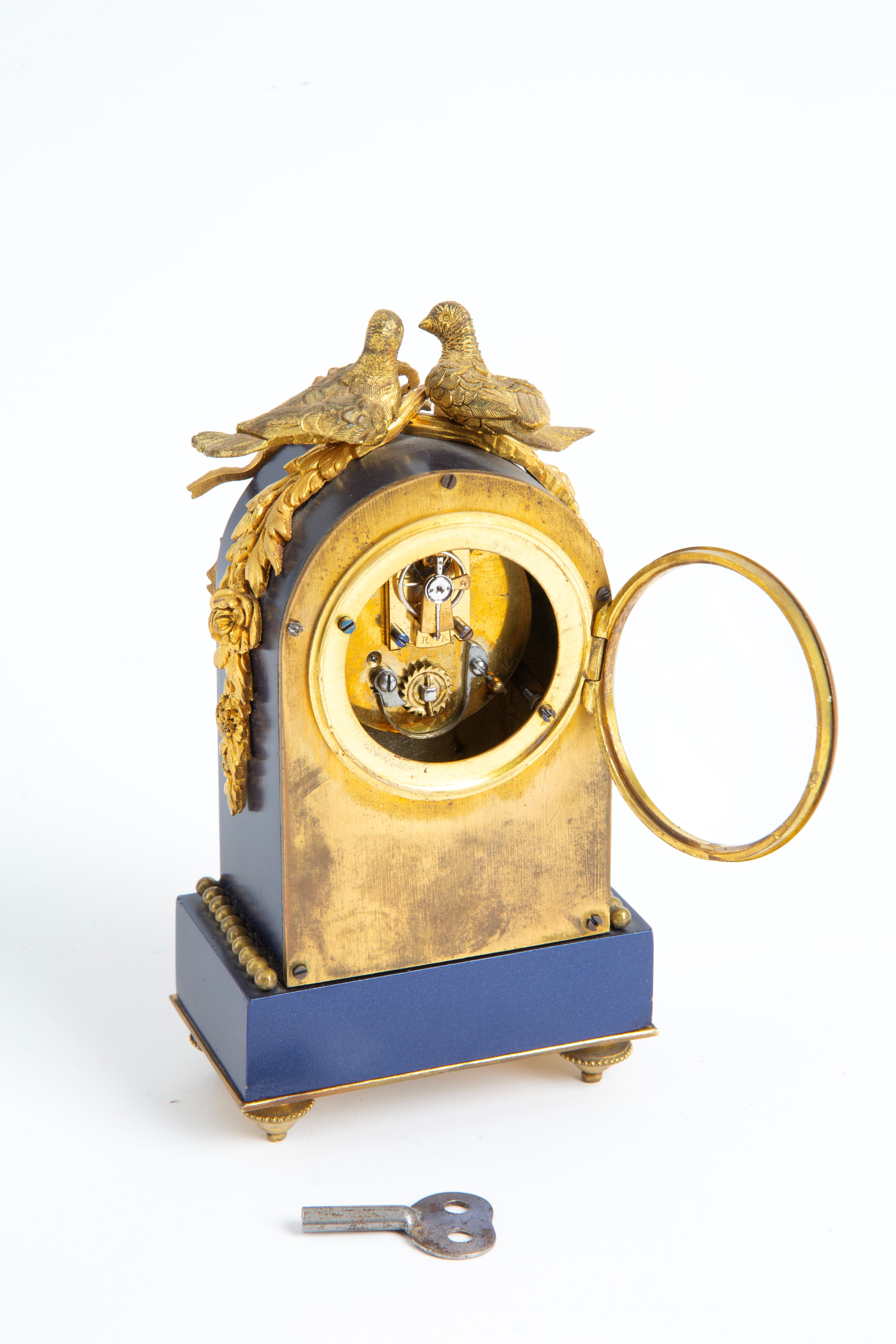 Piccolo Orologio in Smalto e Bronzo