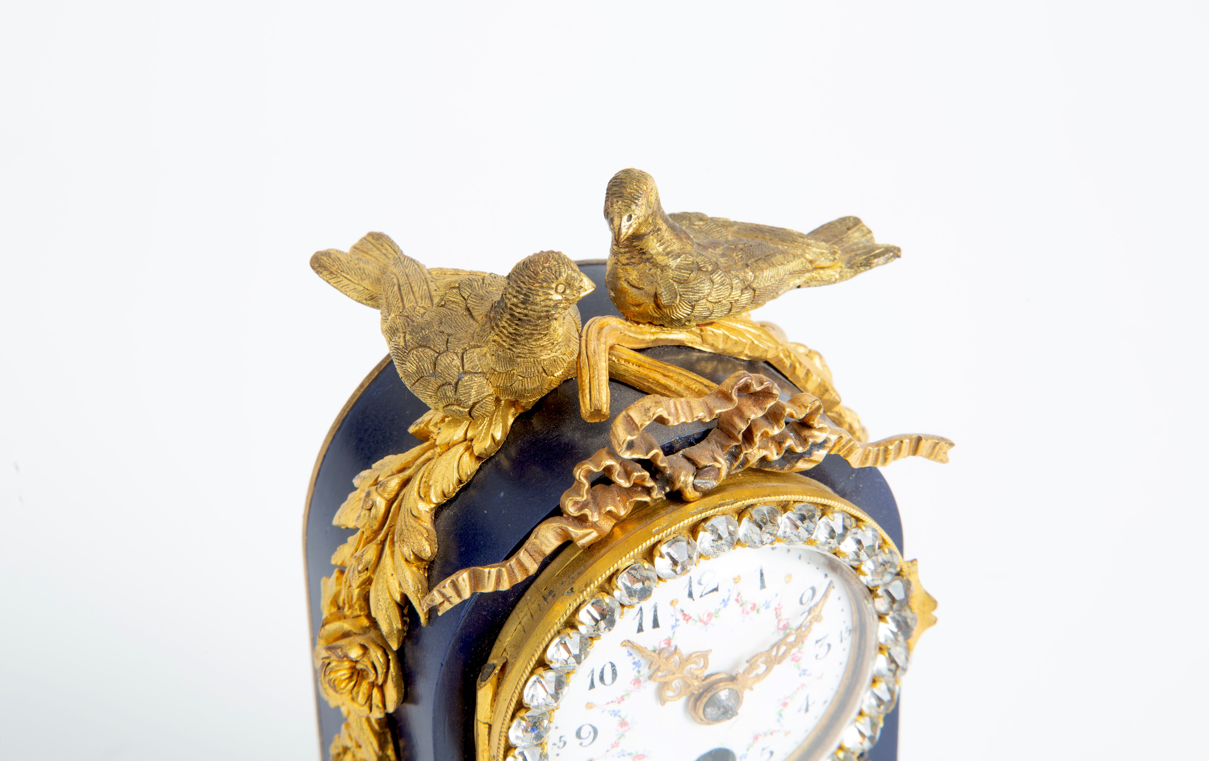 Piccolo Orologio in Smalto e Bronzo