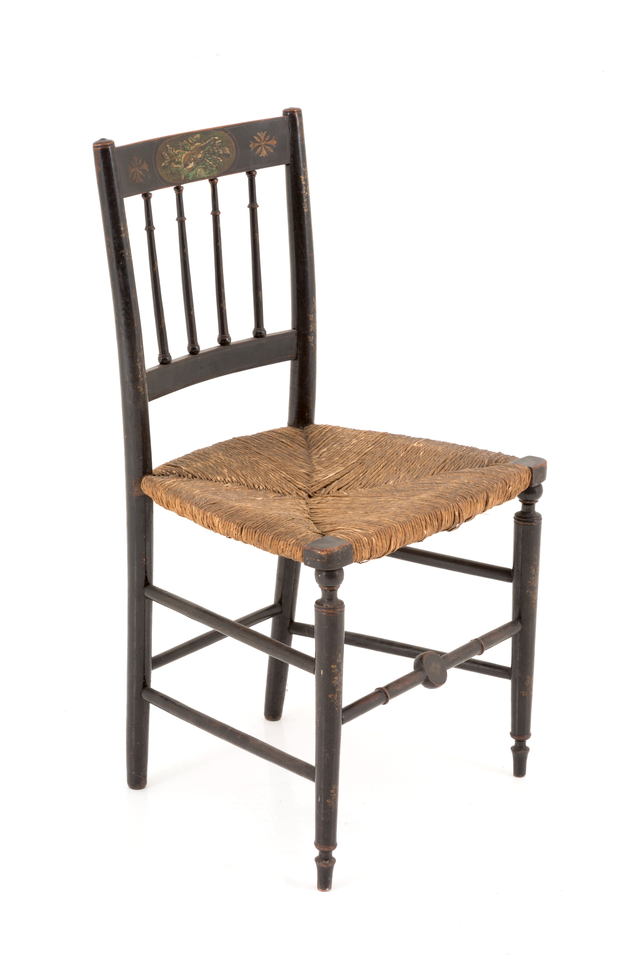 Una poltrona e cinque sedie laccate