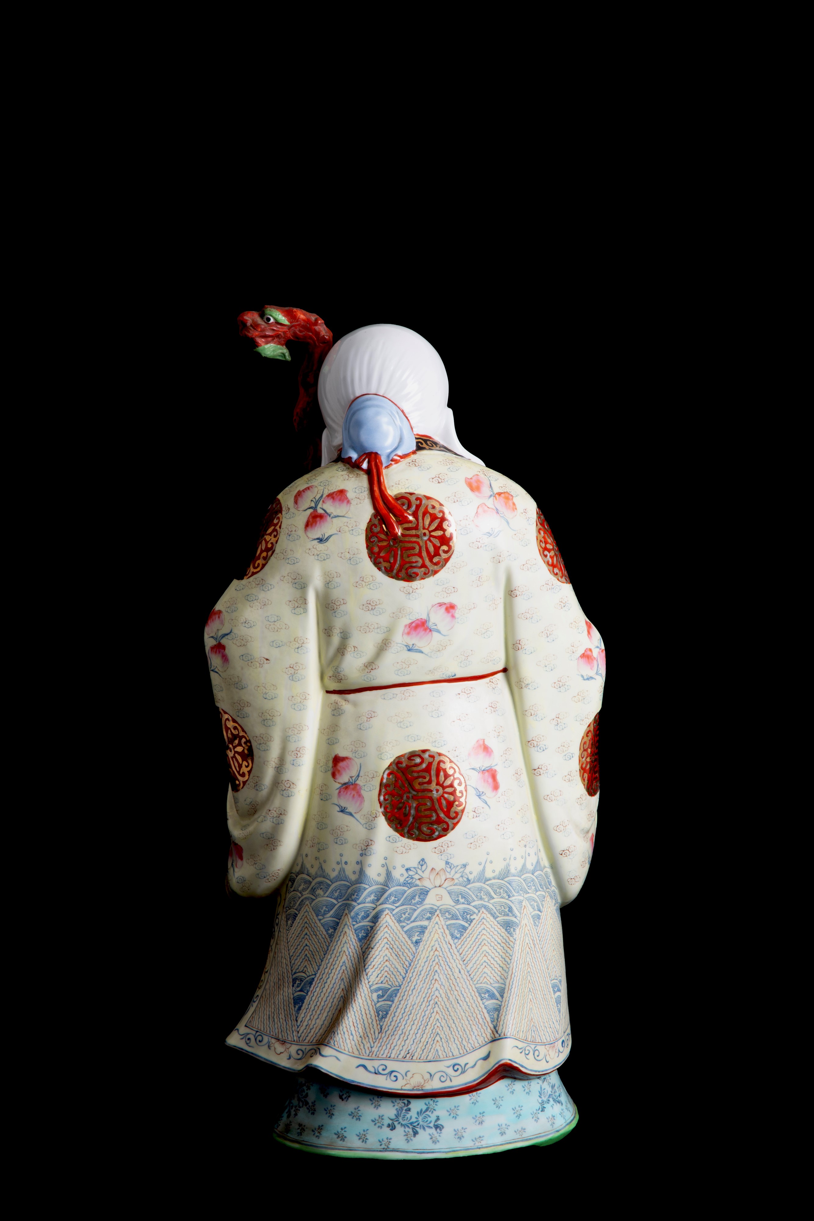 Scultura in porcellana "BUDDHA CON PESCA SACRA"