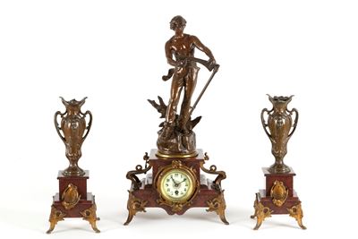 Trittico in marmo rosso e antimonio, composto da orologio e due candelieri, Francia, fine XIX sec...