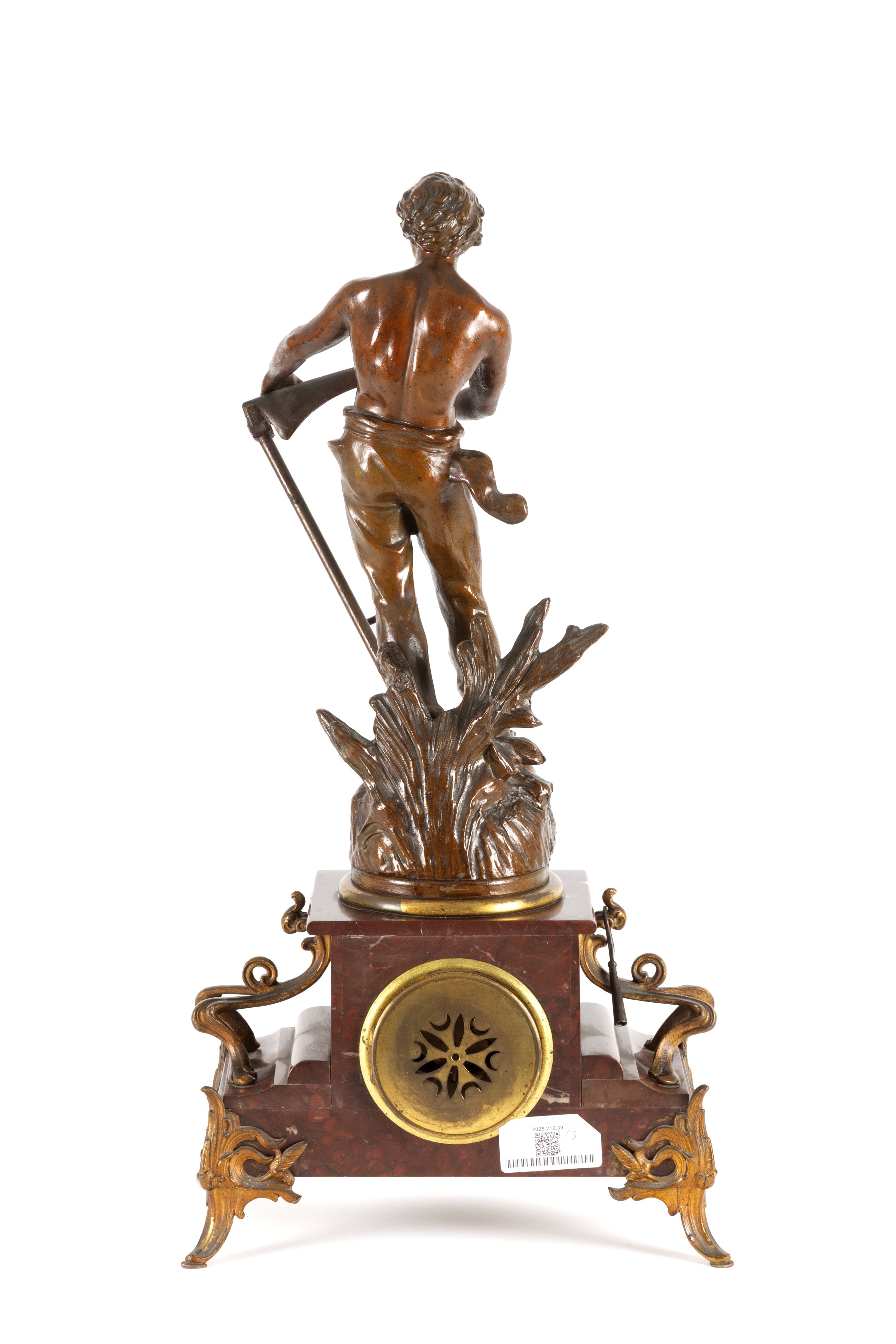 Trittico in marmo rosso e antimonio, composto da orologio e due candelieri, Francia, fine XIX sec...