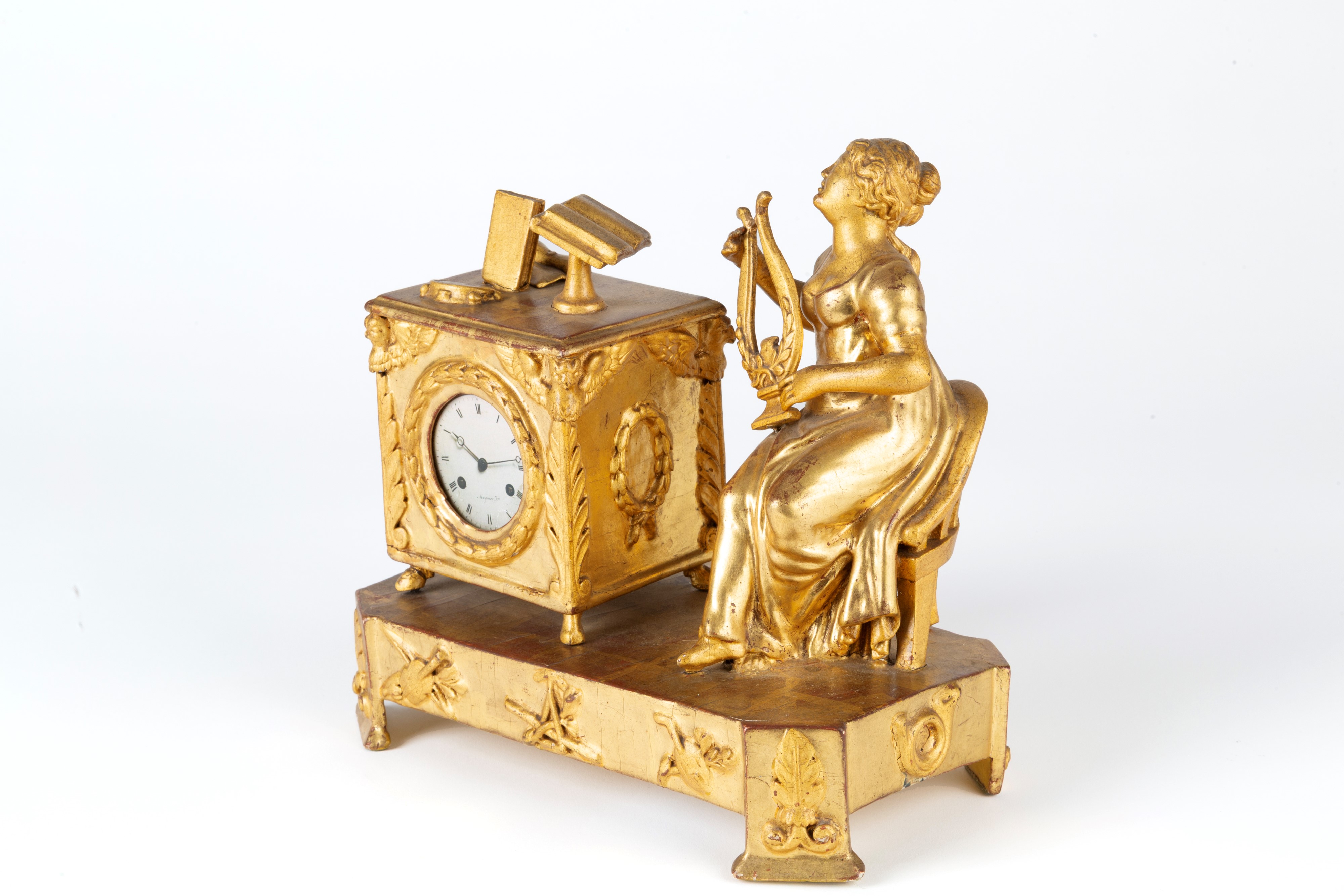 Orologio da tavolo in legno dorato, suonatrice di cetra, Inizi XIX secolo