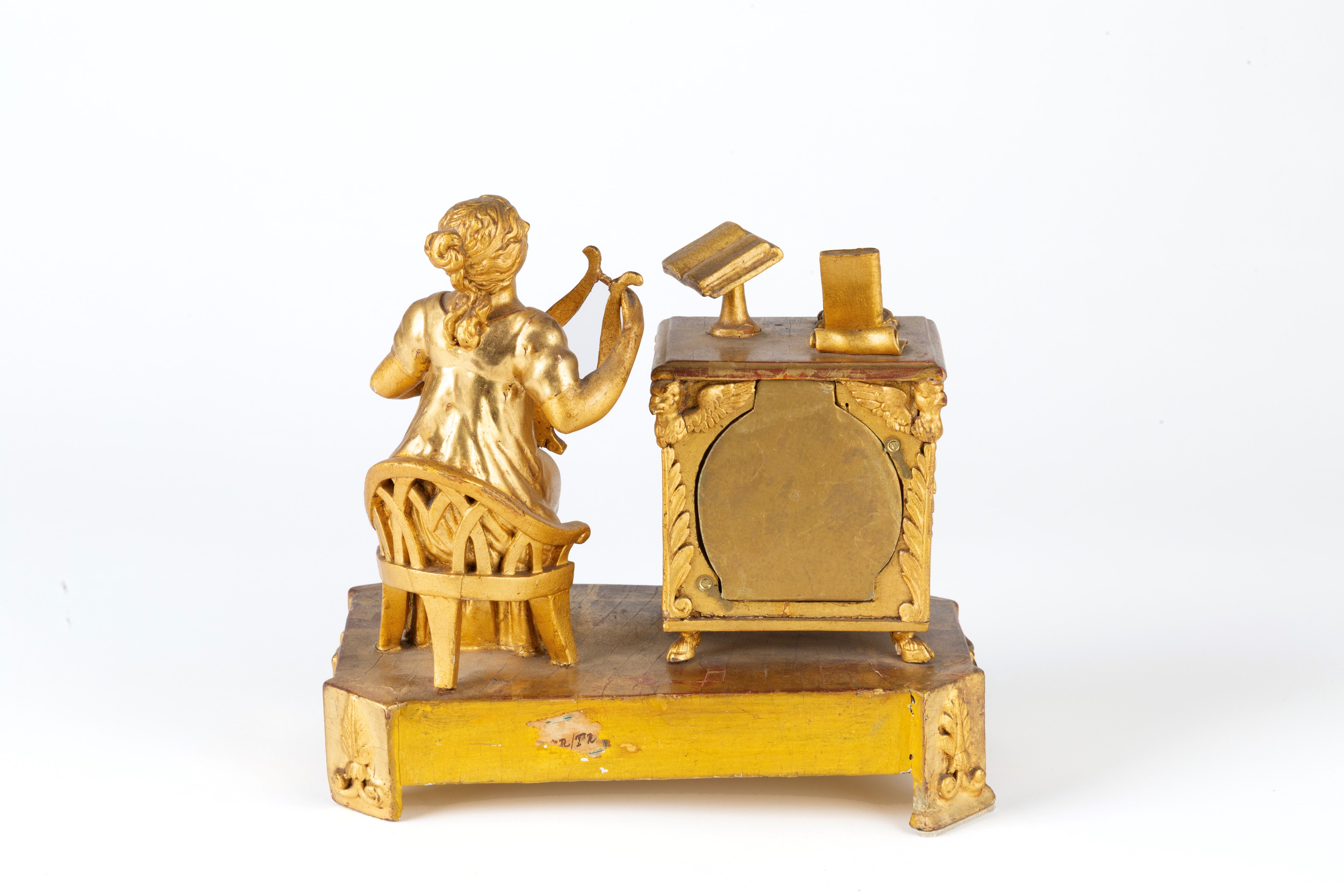 Orologio da tavolo in legno dorato, suonatrice di cetra, Inizi XIX secolo