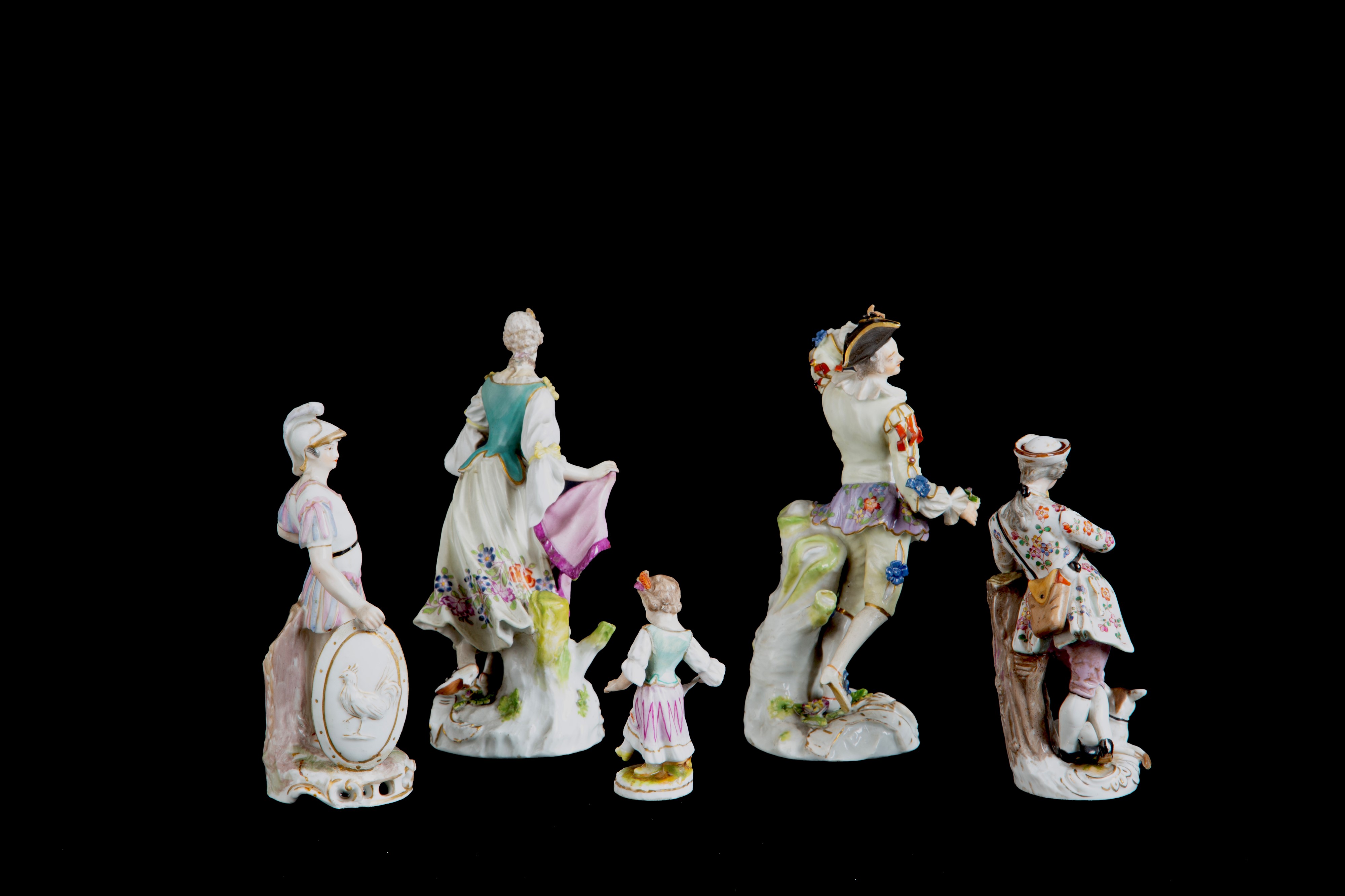Cinque statuette in porcellana "PERSONAGGI". MEISSEN