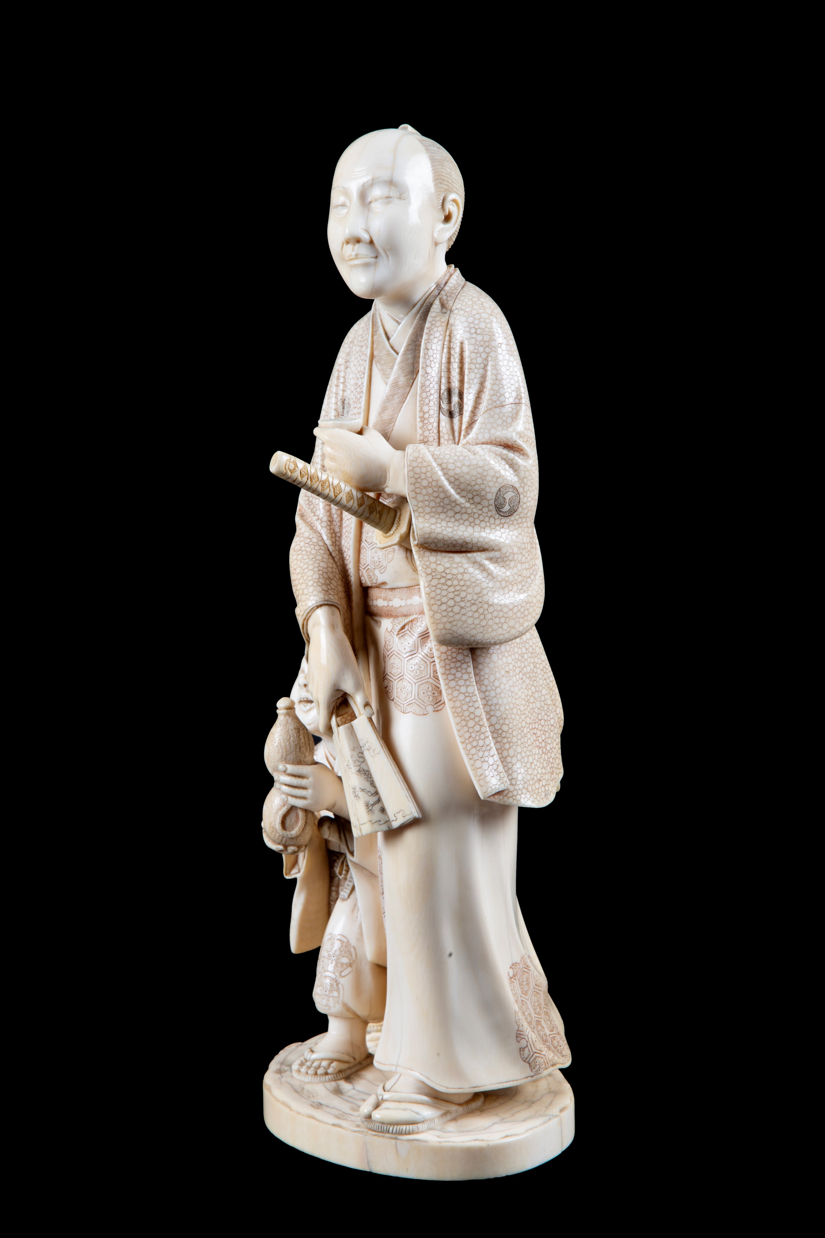 Okimono in avorio "SAMURAI CON BAMBINO"