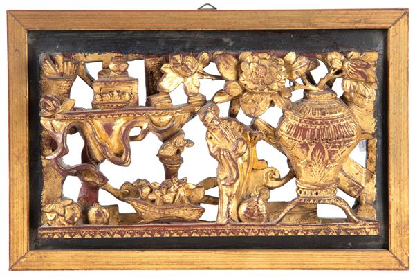 Carved wooden plaque