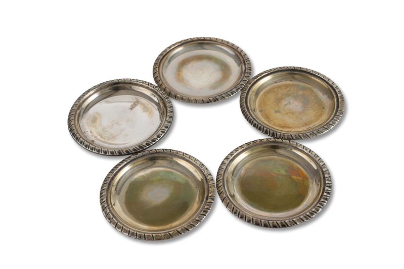 Cinque sottobicchieri, argento 800, XX secolo