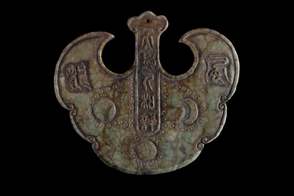 Carved jade pendant