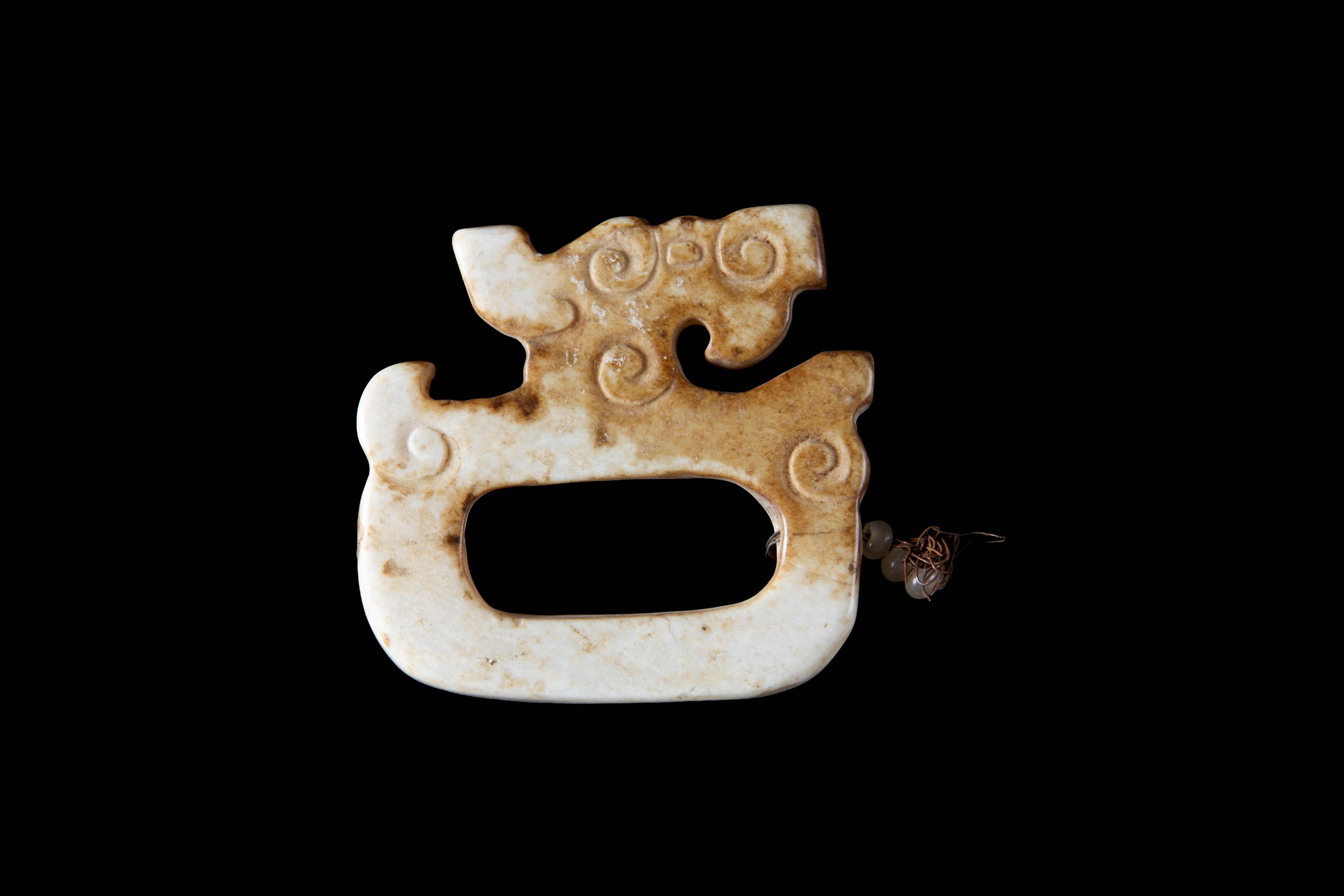 Pendente in giada con testa di drago