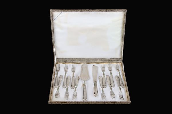 Set of twelve dessert cutlery with silver handles