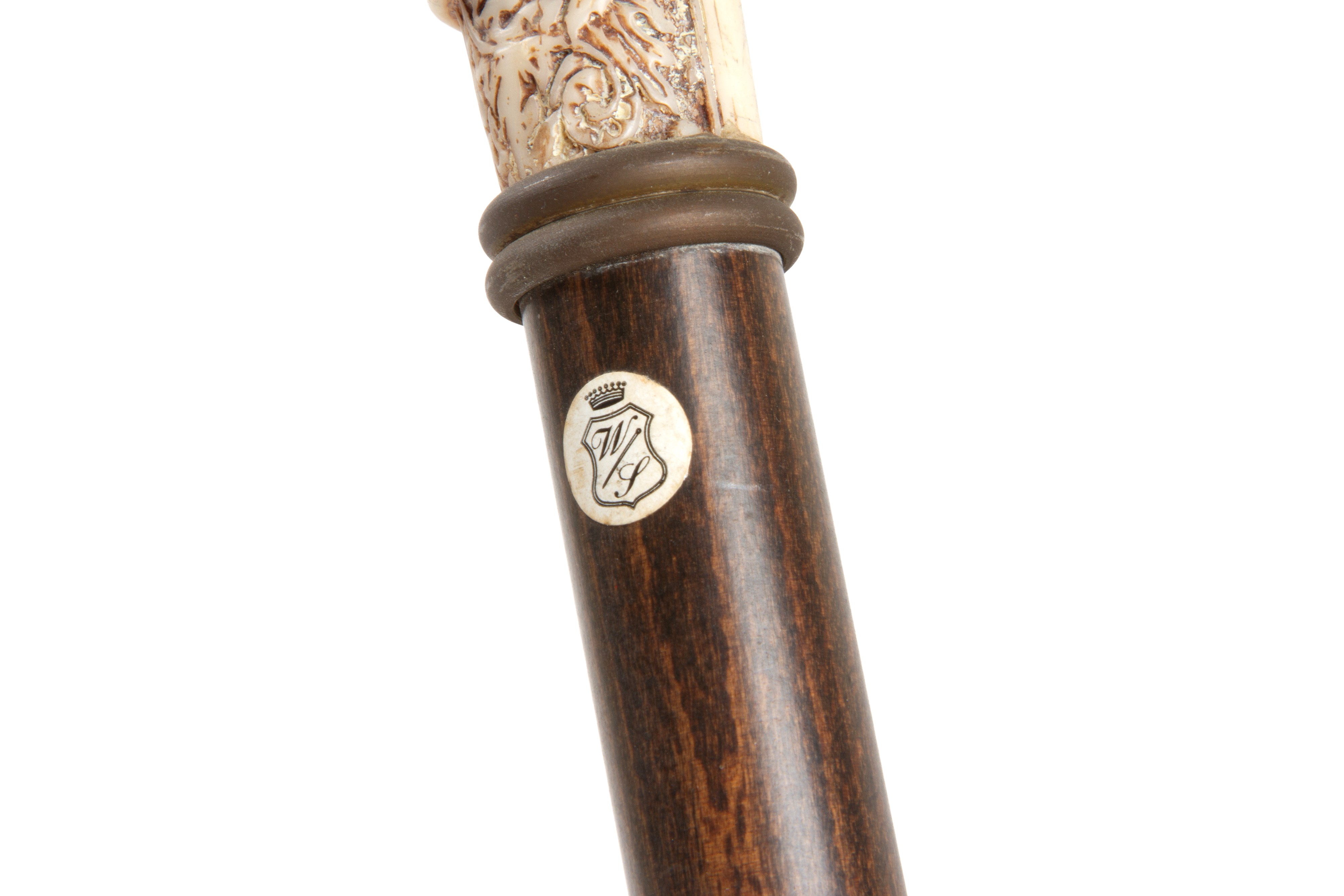 Tre bastoni in legno con impugnature variate, XX secolo