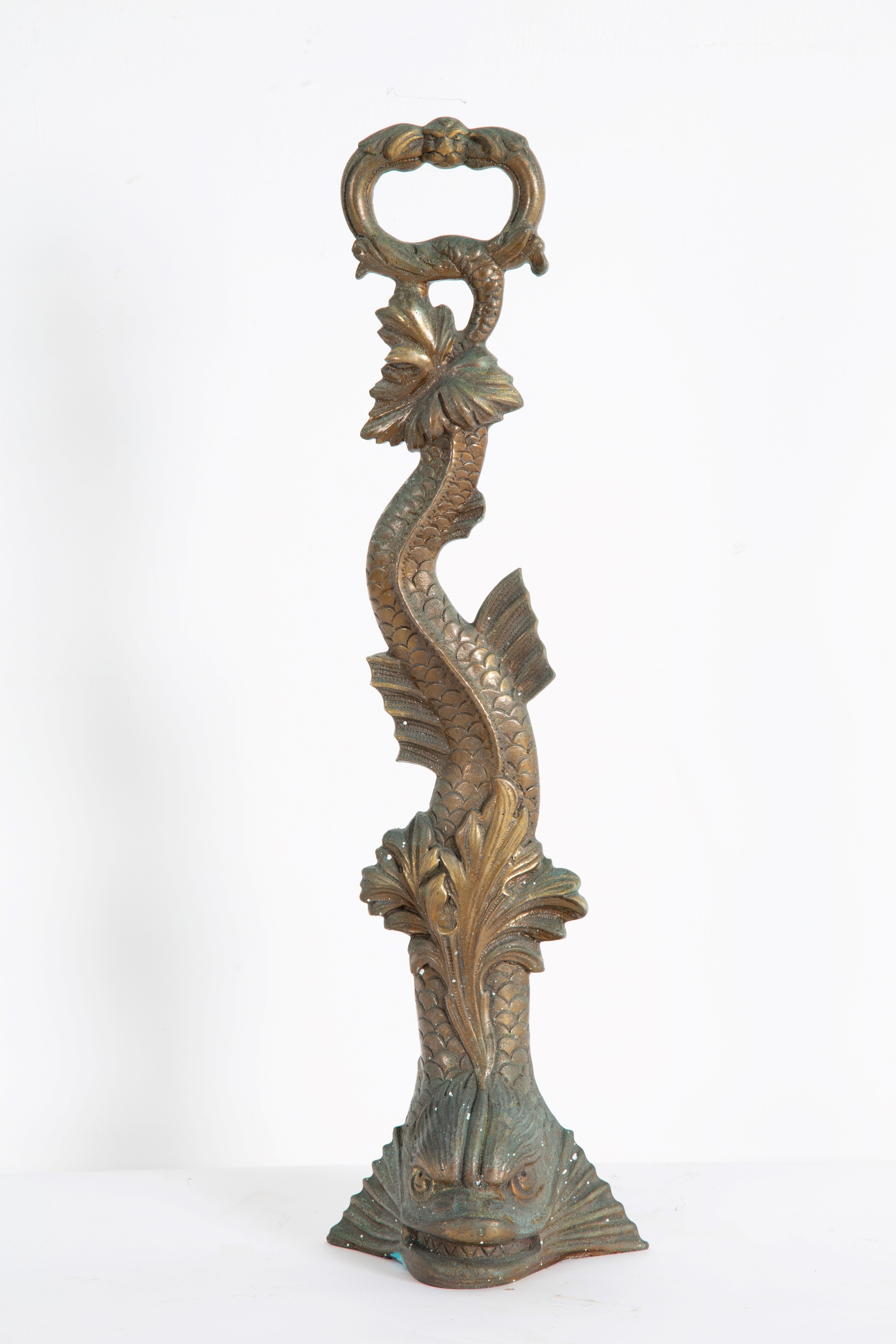 Cinque fermaporte in bronzo parzialmente dorato a forma di tritoni, XX secolo