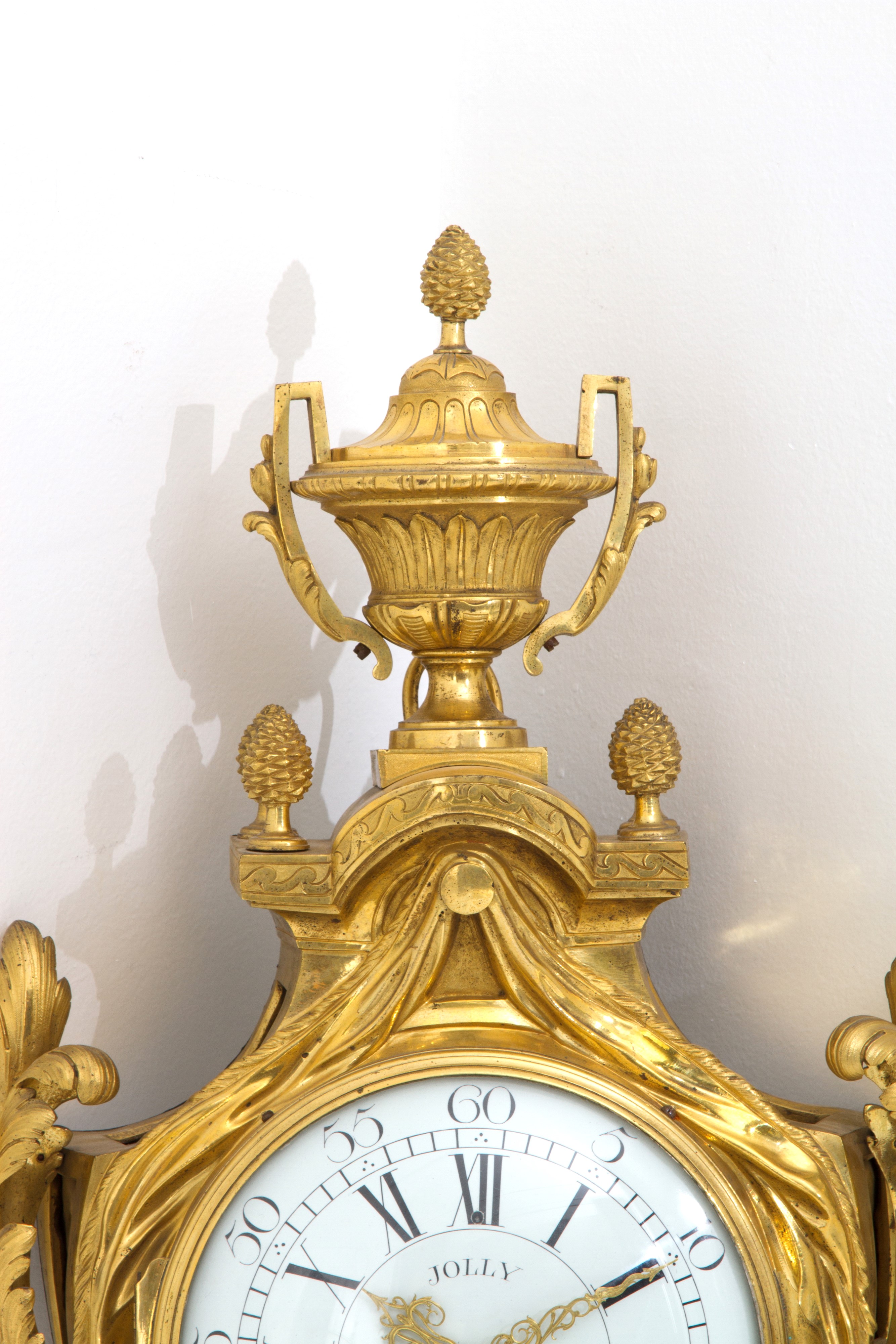 Orologio Cartel da muro in bronzo dorato e smaltato, XIX secolo