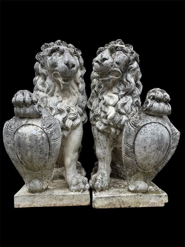Pair of sculptures "LIONS WITH COAT OF ARMS"