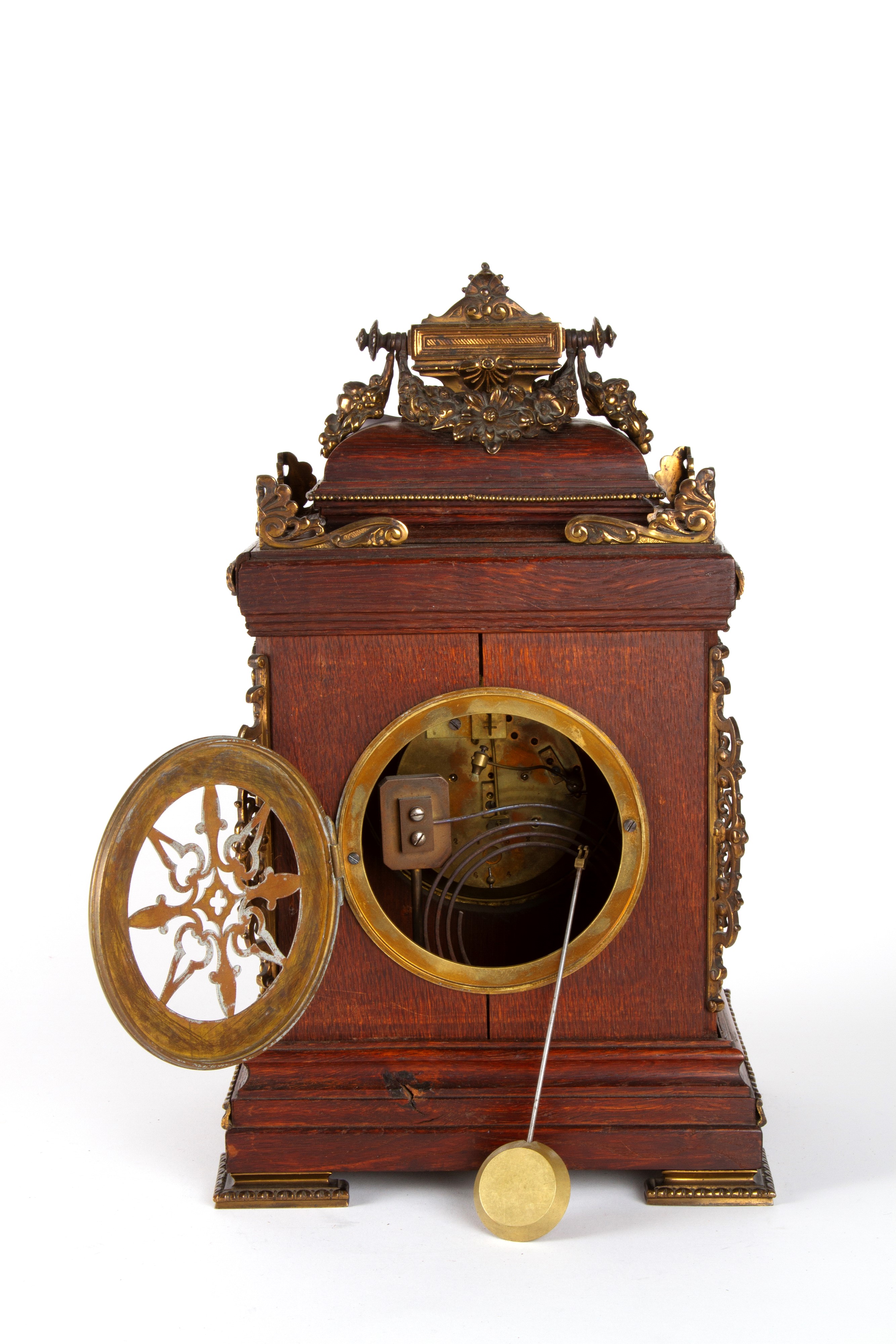Orologio in legno e bronzo, decorazioni e guarnizioni in metallo, XX secolo