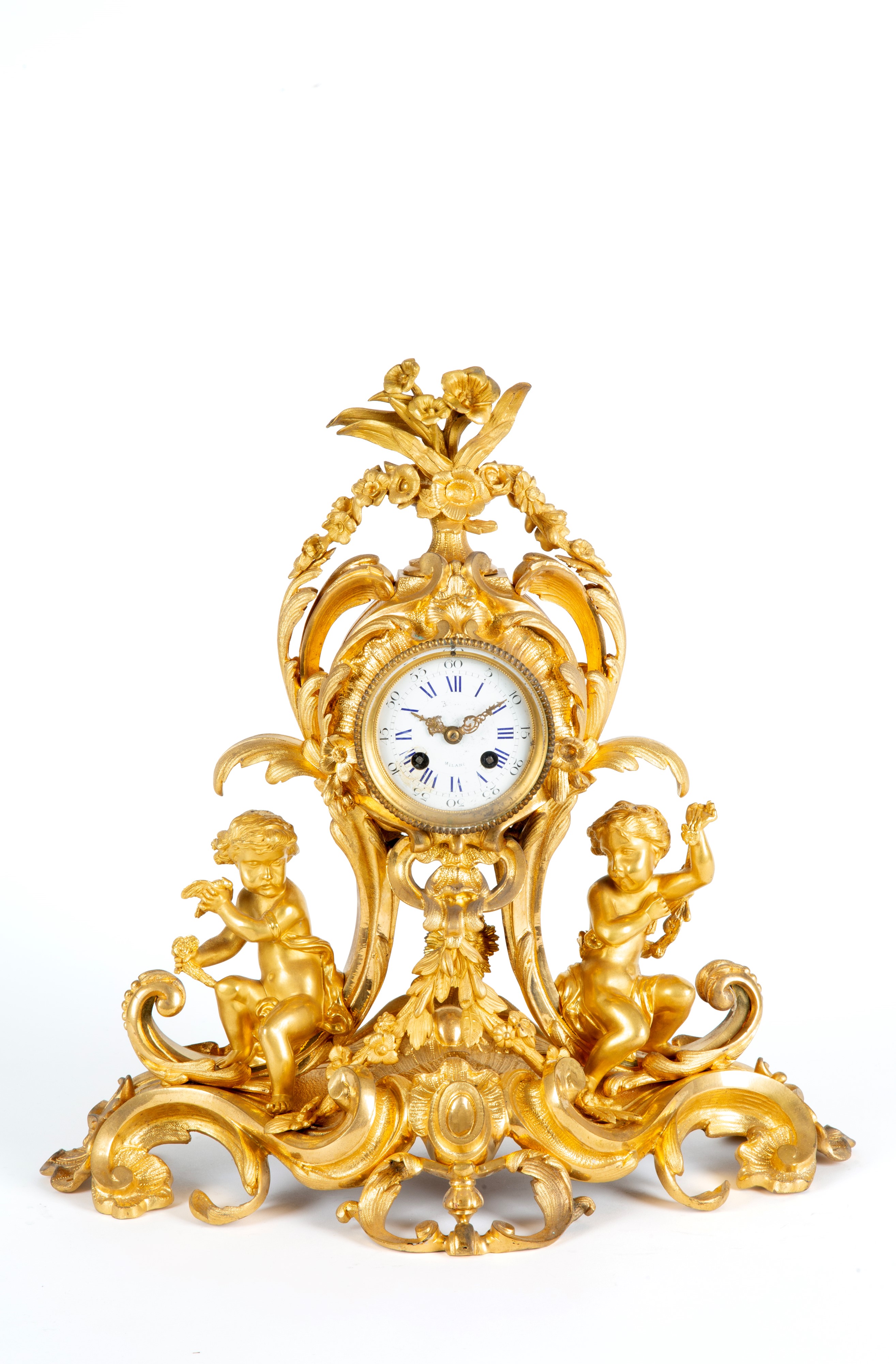 Trittico, bronzo dorato al mercurio finemente cesellato con putti e quadrante in smalto bianco (X...