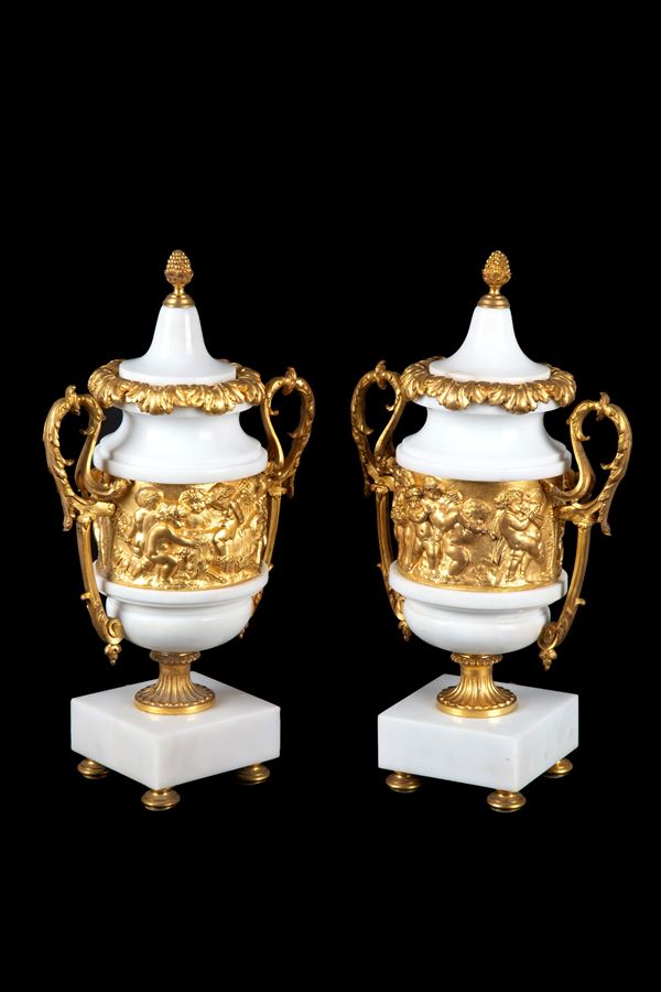 Pair of marble and bronze vases