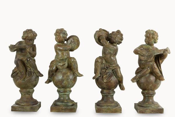 Four sculptures "PUTTI MUSICANTI"