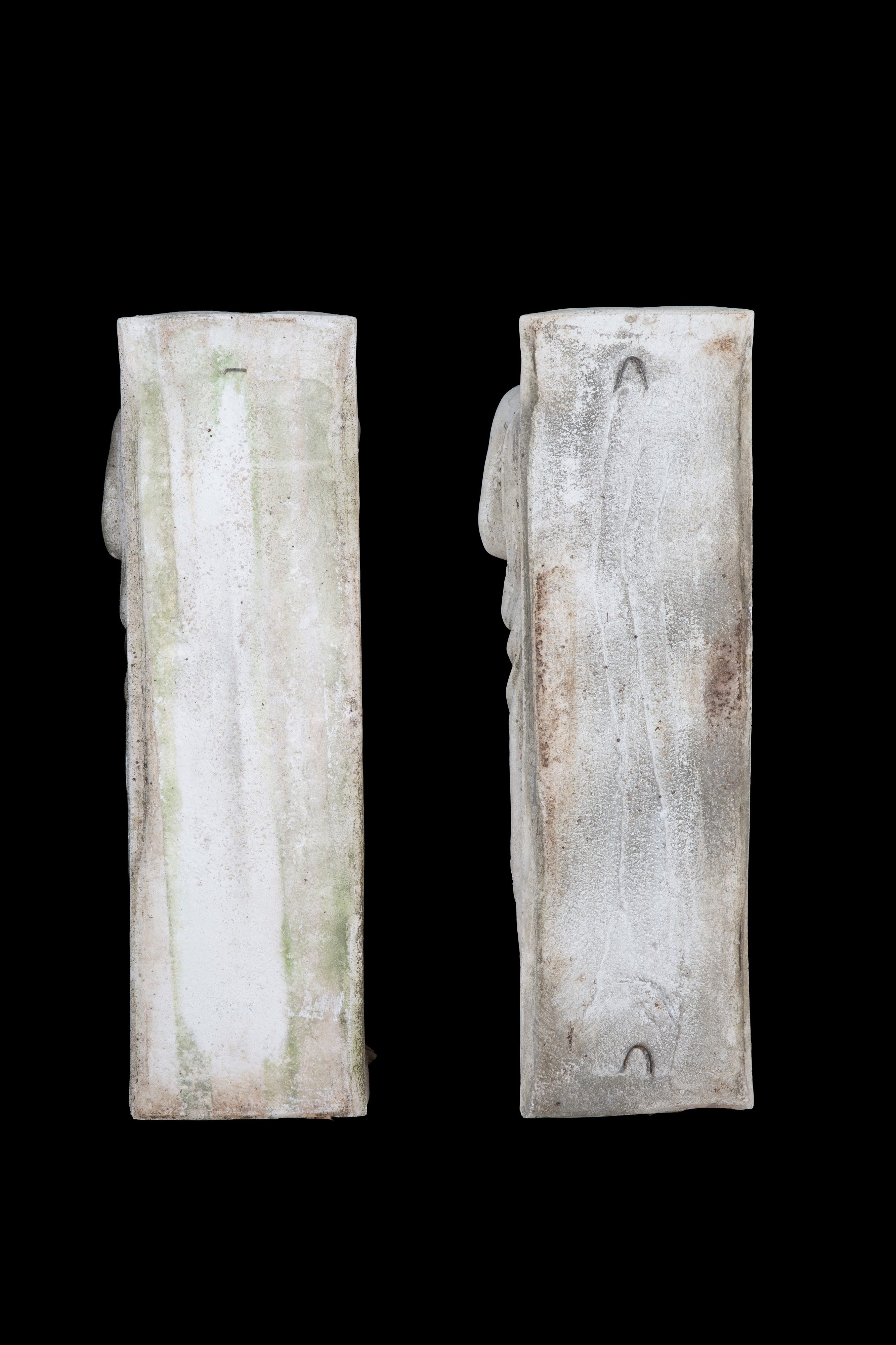 Coppia di lesene, figure maschili, pietra composita, XX secolo