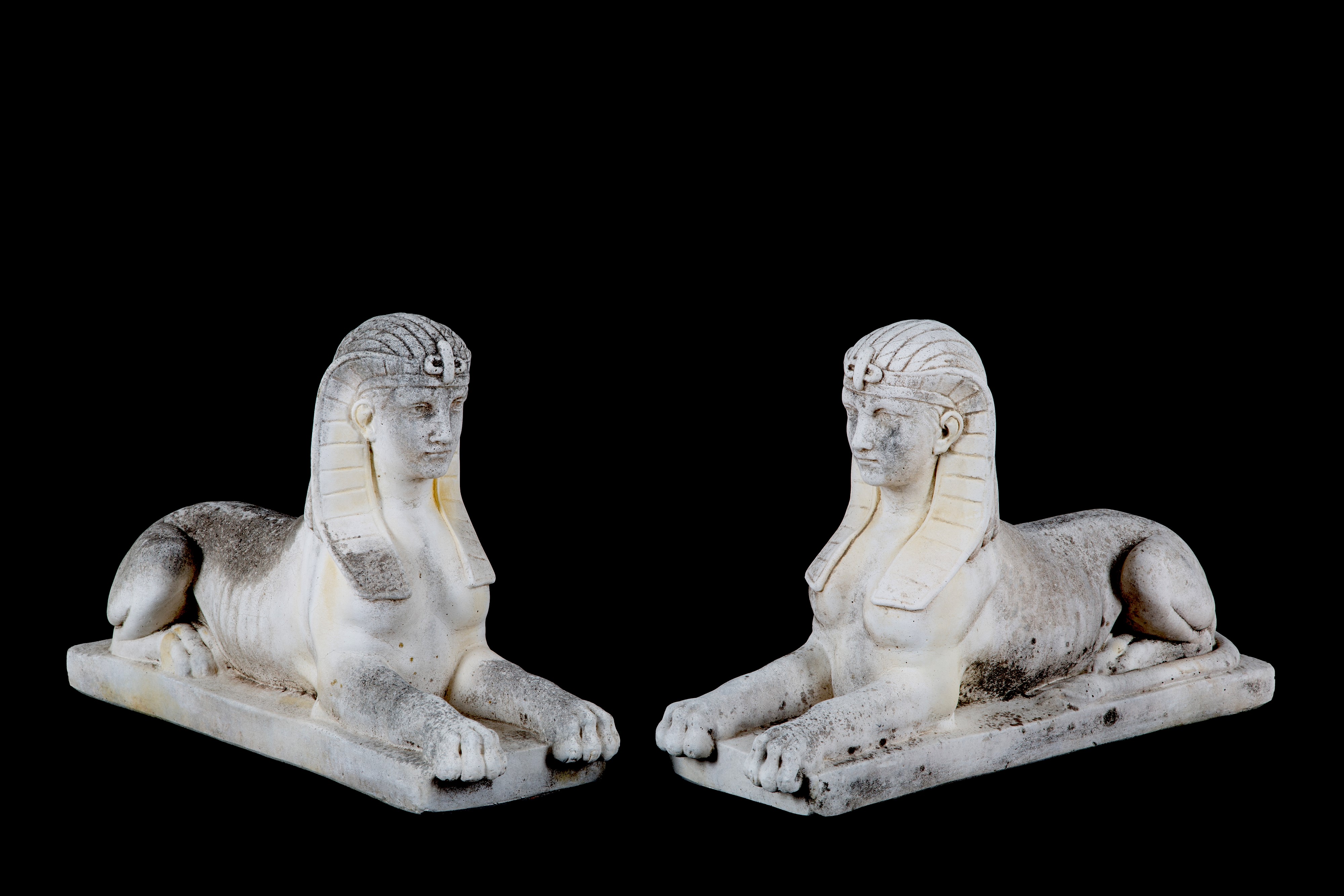 Coppia di sculture “Sfingi”, scultura in pietra composita, XX secolo