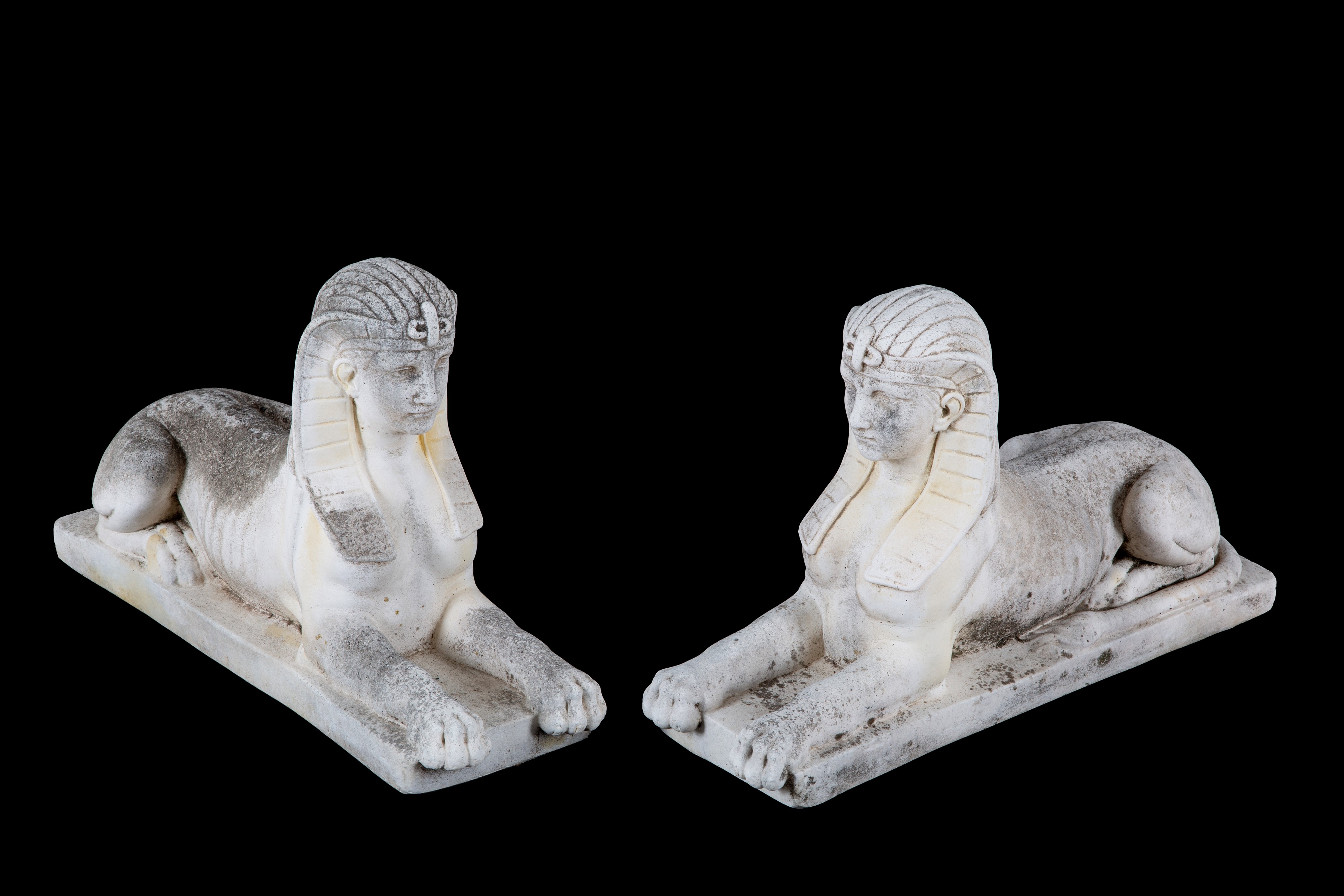 Coppia di sculture “Sfingi”, scultura in pietra composita, XX secolo