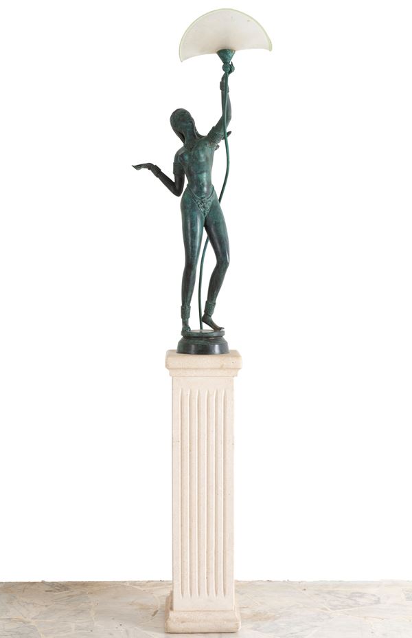 Lamp with sculpture