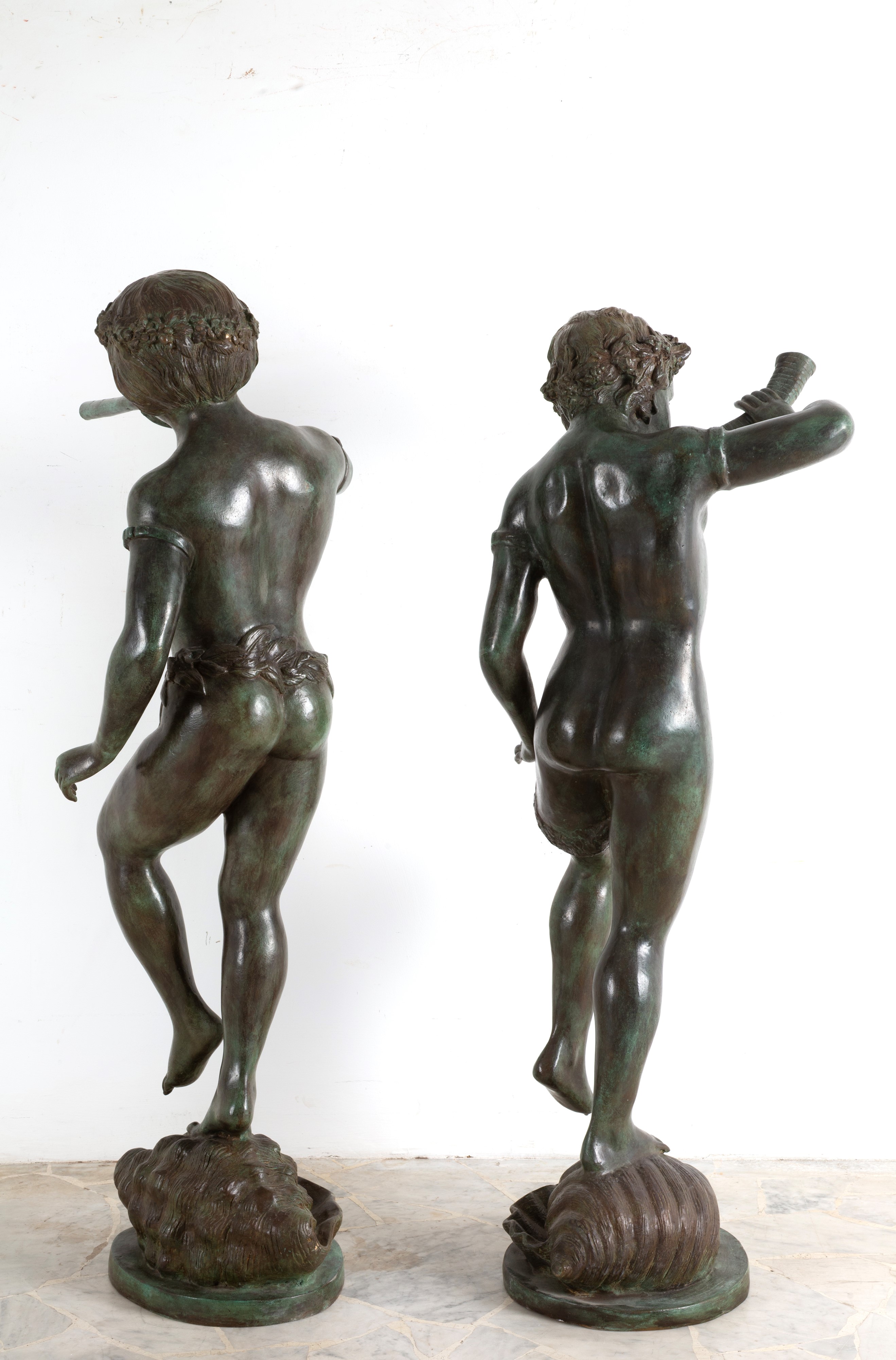 Coppia di sculture raffiguranti Fauni, bronzo patinato, XX secolo