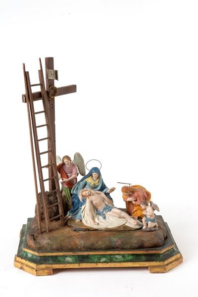 Gruppo scultoreo raffigurante il «Compianto su Cristo morto», terracotta e legno laccato e dorato...