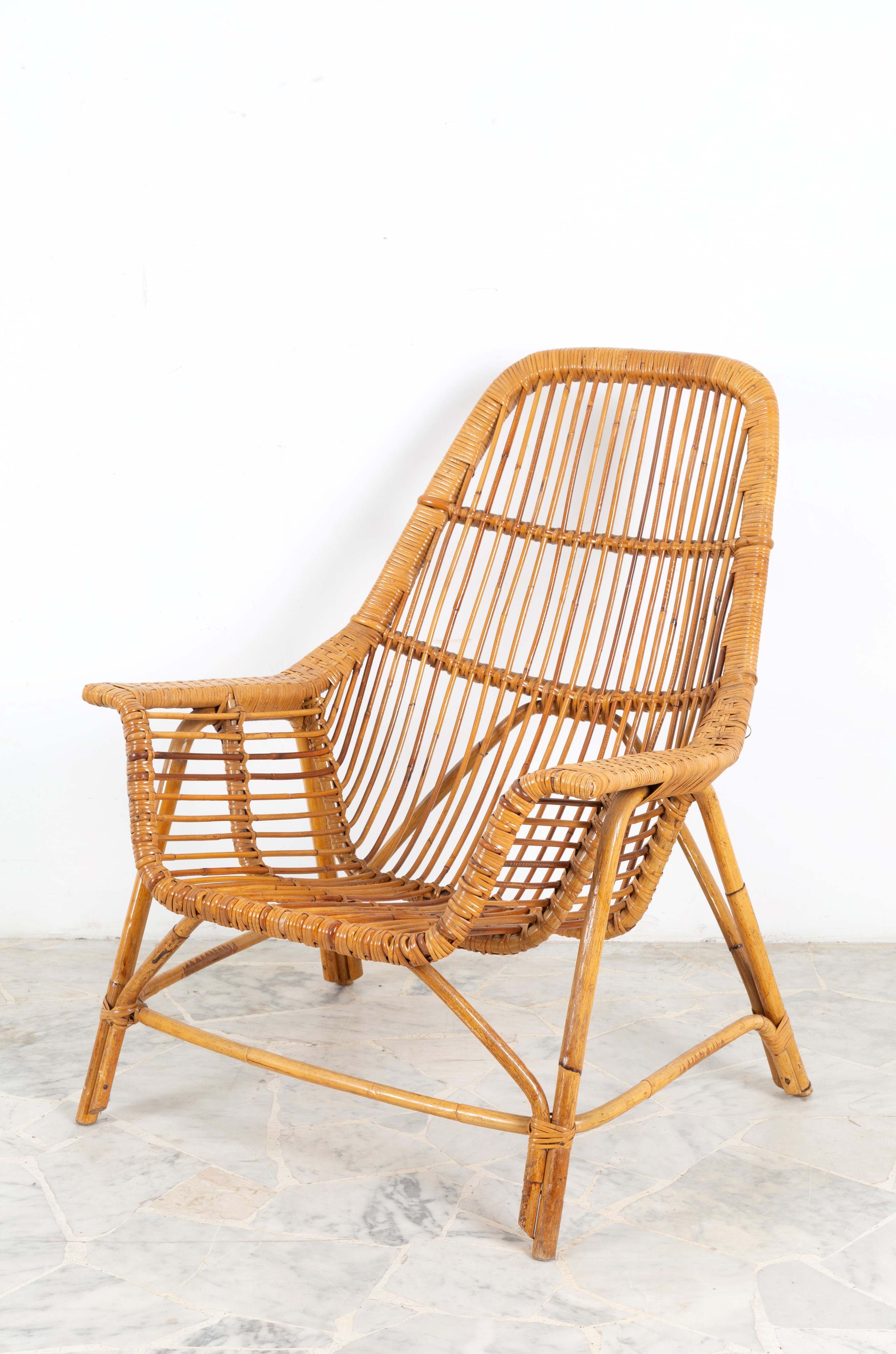 Gervasoni, Set da giardino in rattan: due poltrone e tavolino rotondo (anni '70)