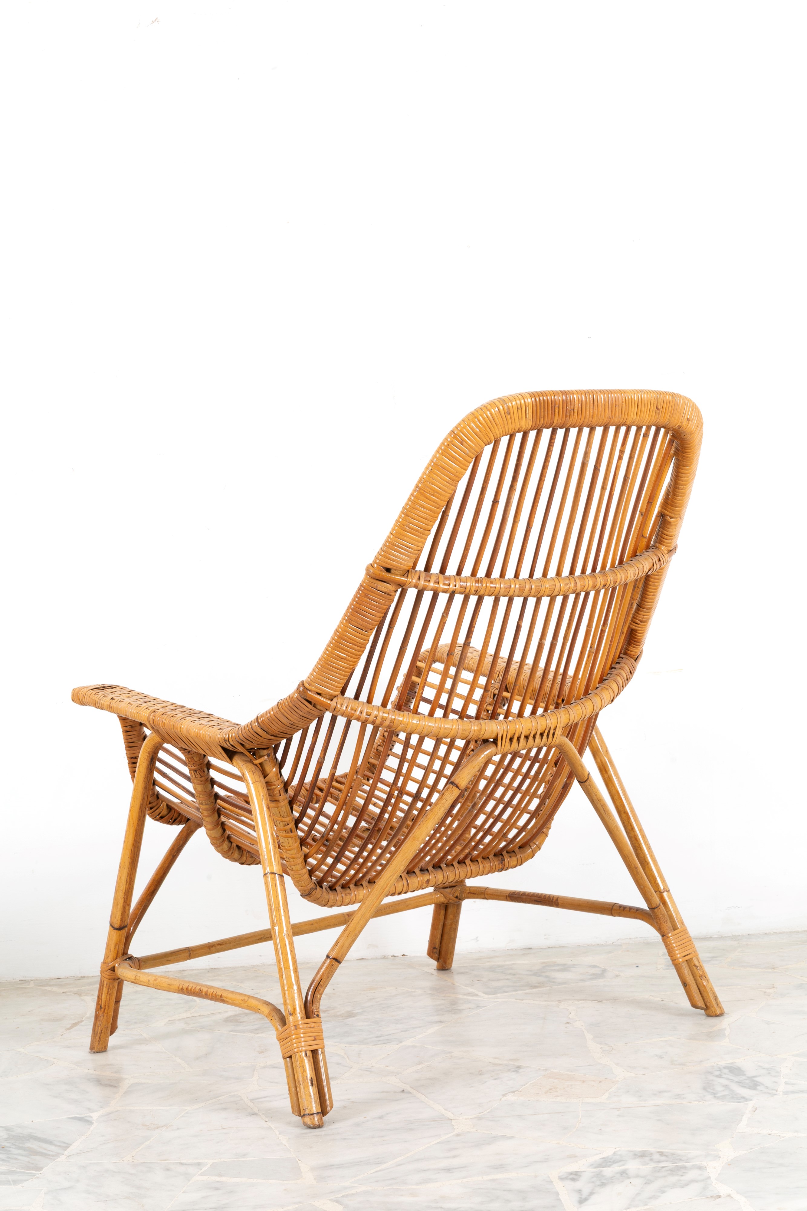 Gervasoni, Set da giardino in rattan: due poltrone e tavolino rotondo (anni '70)