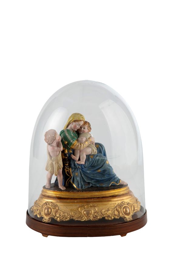 Sculpture under a glass bell jar