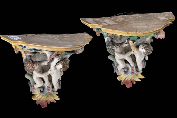 Pair of majolica shelves