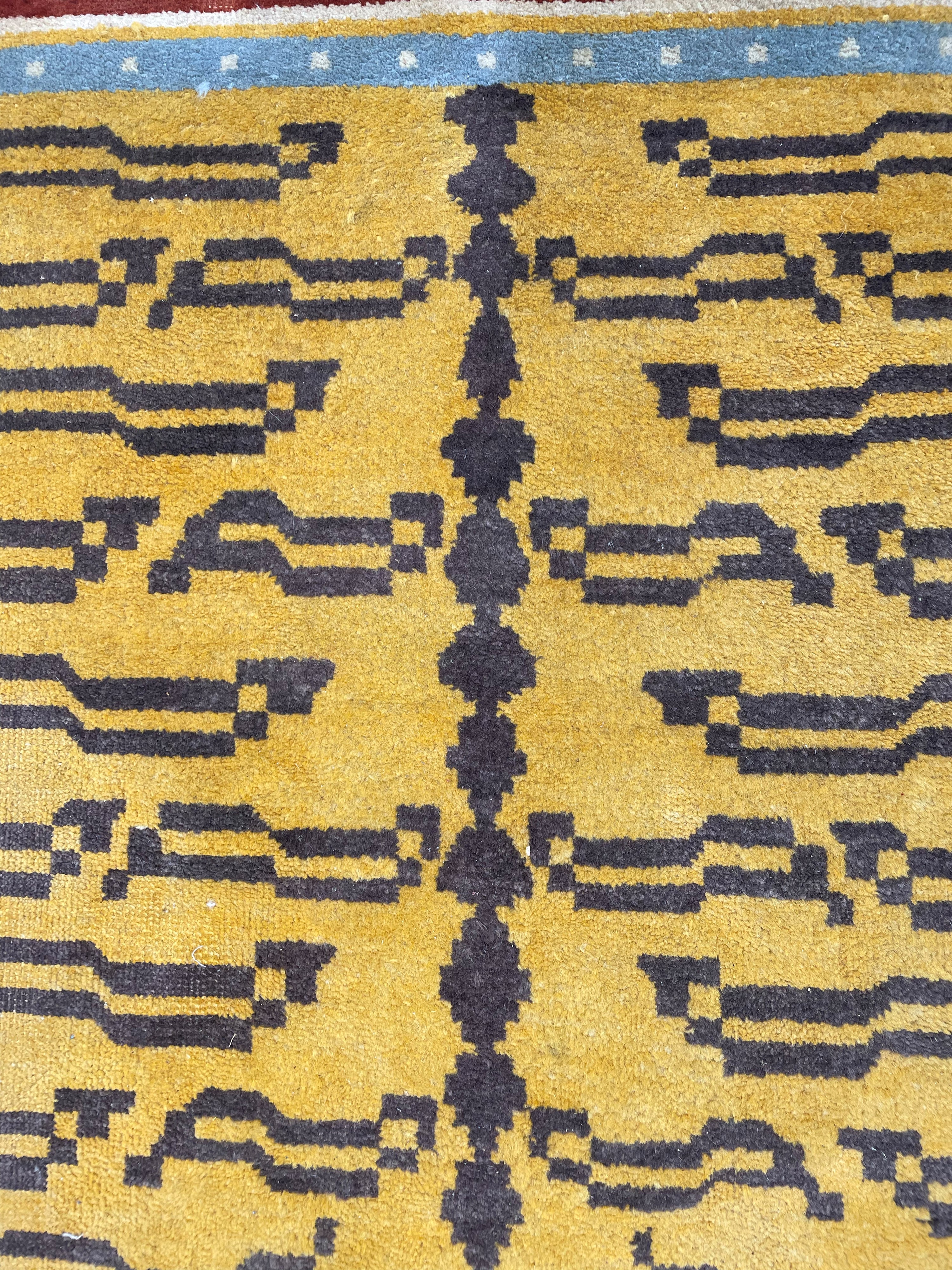Tappeto con disegno a tigre, Tibet, prima metà del XX secolo, 207x101 cm ca.