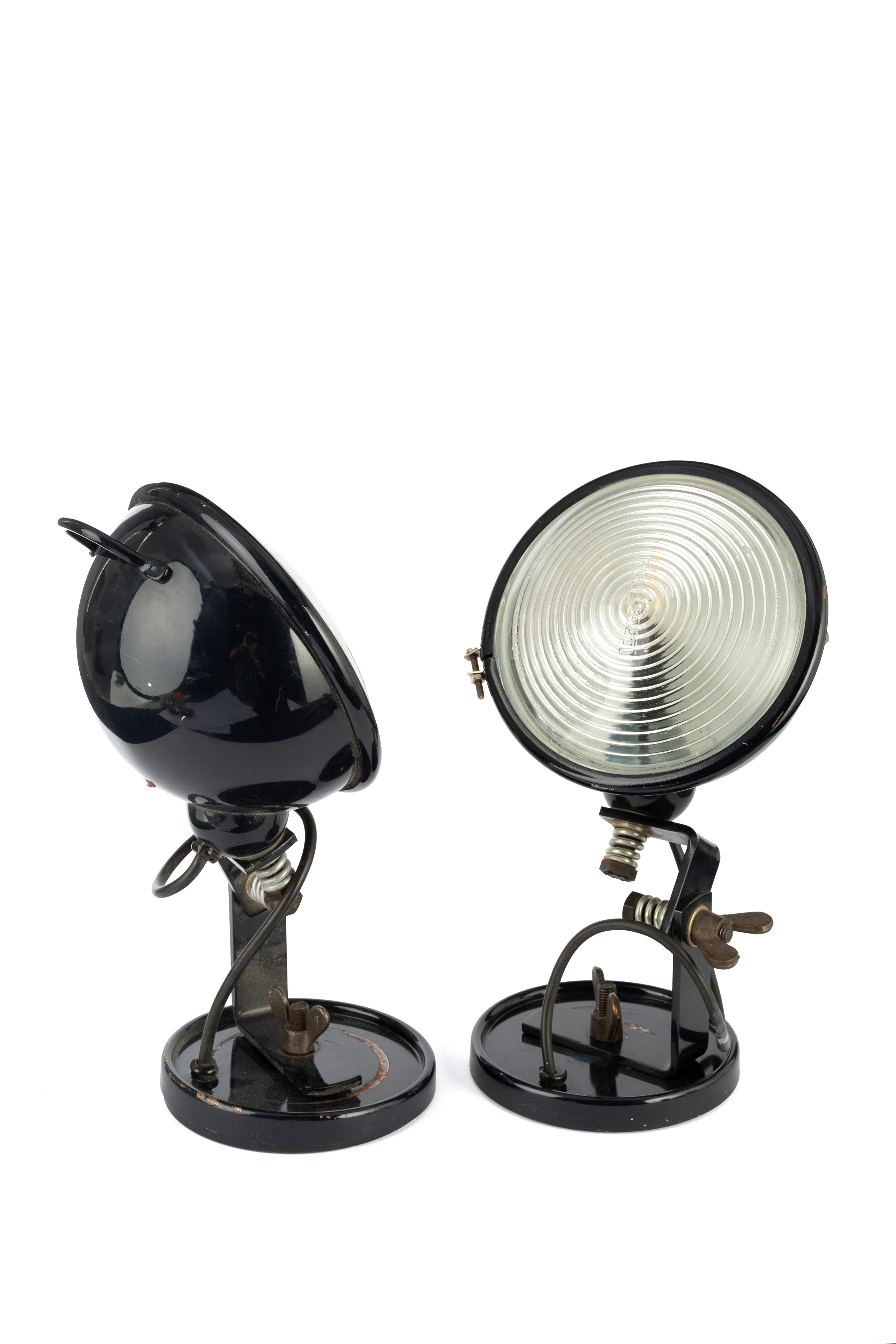 Set di quattro lampade snodabili, metallo nero con vetro a faro, anni ’70 (una con vetro mancante...
