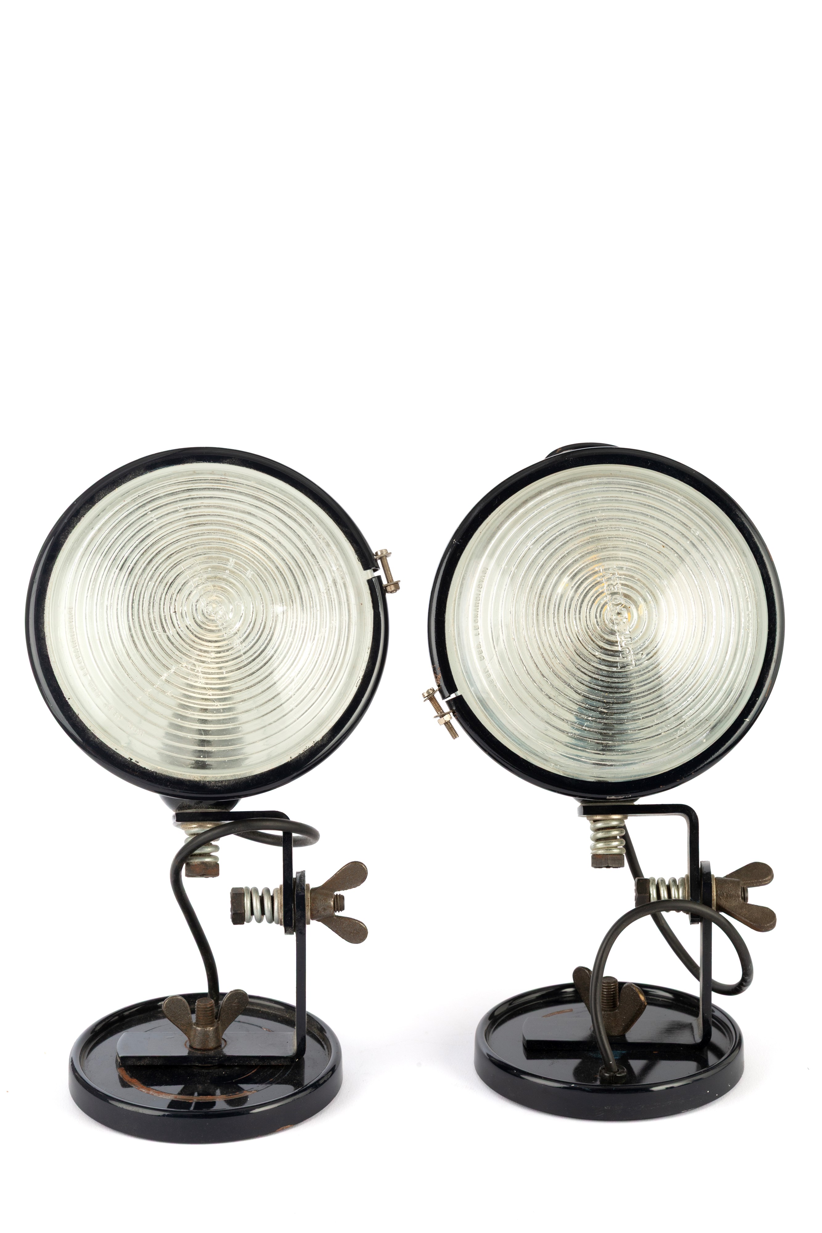 Set di quattro lampade snodabili, metallo nero con vetro a faro, anni ’70 (una con vetro mancante...