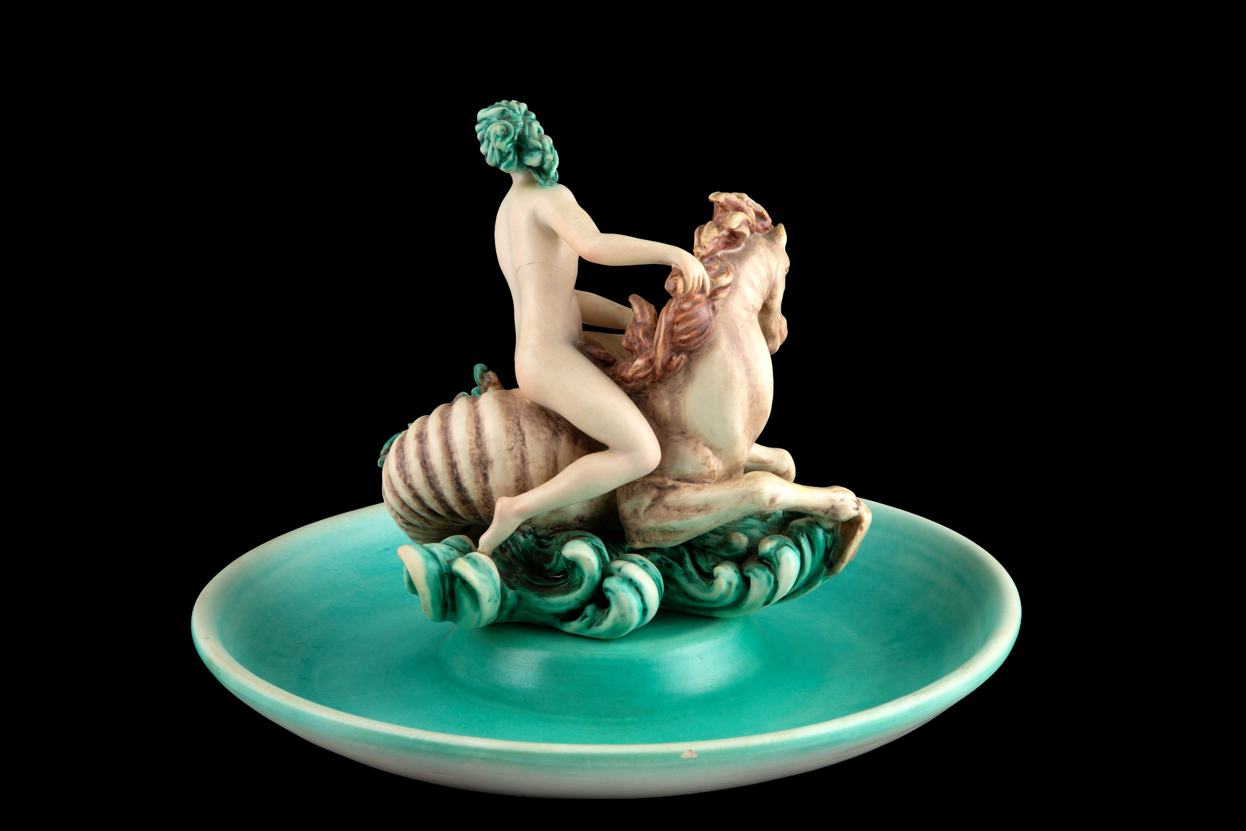 Nove di Bassano, Centrotavola con scultura raffigurante “Donna nuda a cavallo” in ceramica dipint...