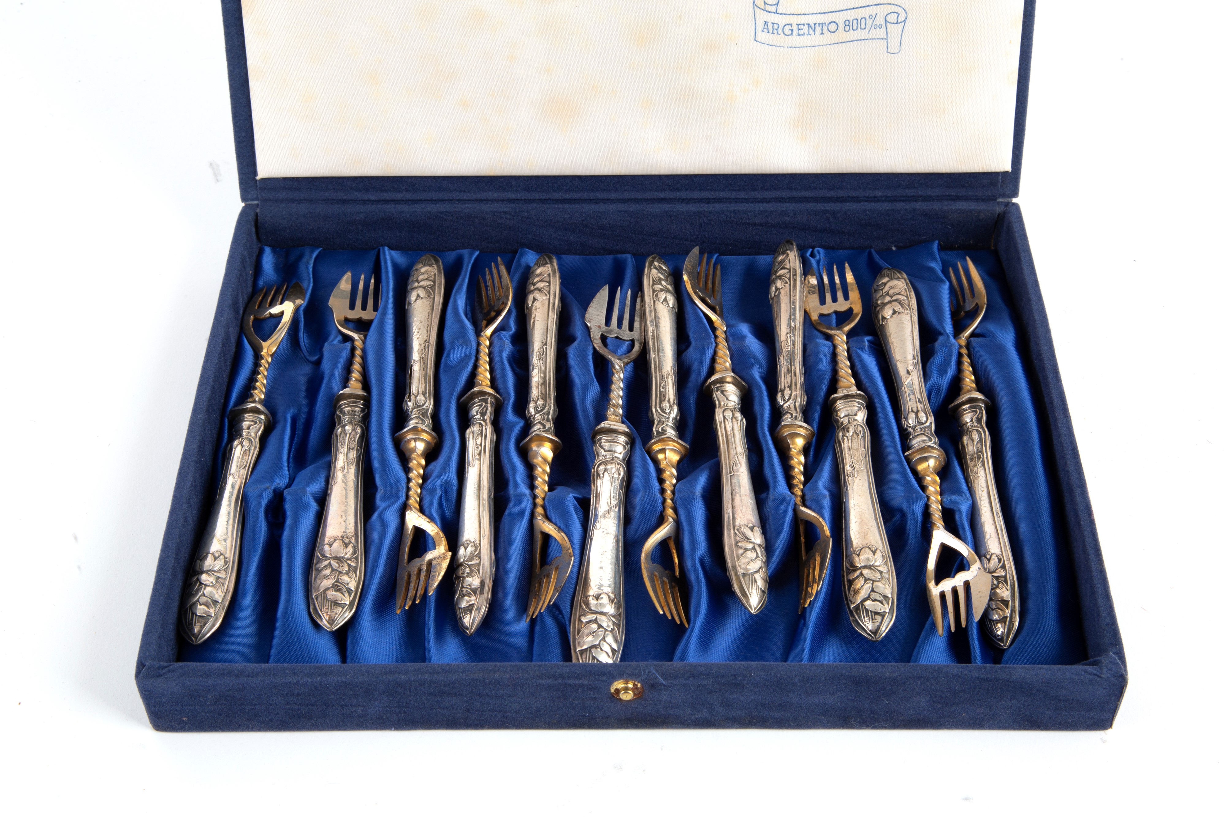 Set di dodici forchette da dolce, argento 800 e vermeil (XX secolo)